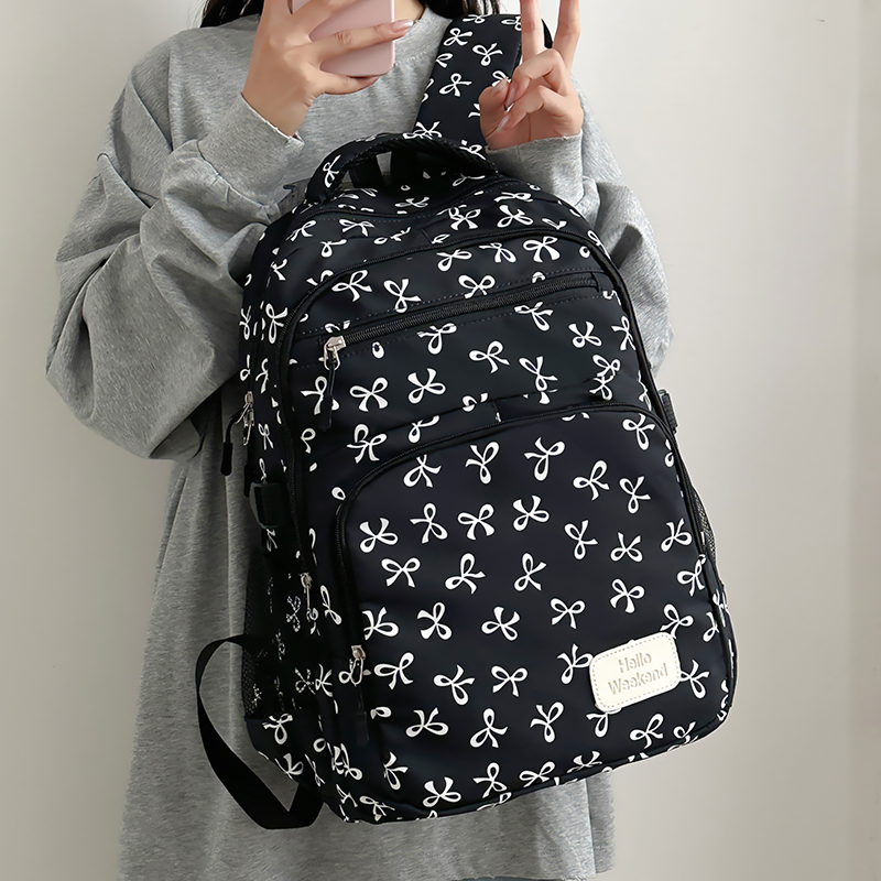 حقيبة ظهر بطبعة فيونكة لطيفة م - مراجعة Sling Backpack Shoulder وسعره